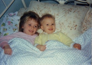 My sister and I at home. I remember those sheets! we still have that blanket!